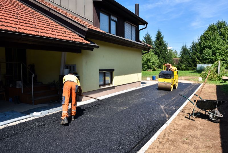 Local Asphalt Driveway Resealing pros at work